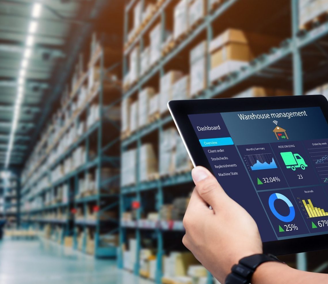 Smart,Warehouse,Management,System.worker,Hands,Holding,Tablet,On,Blurred,Warehouse